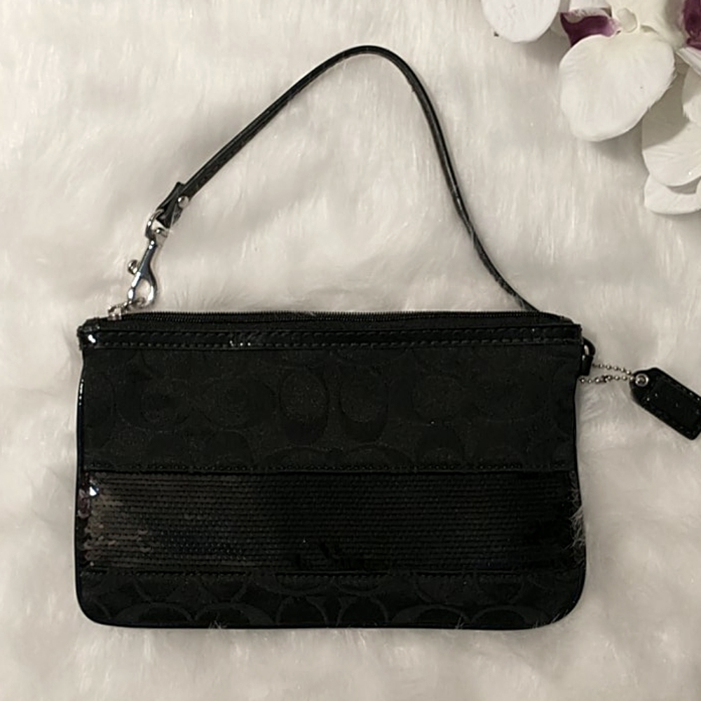 Adorable sequin Coach wristlet